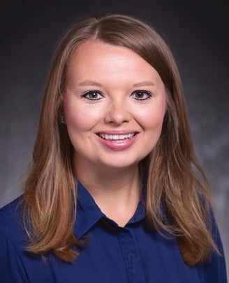 Megan Berard in an official portrait style photo