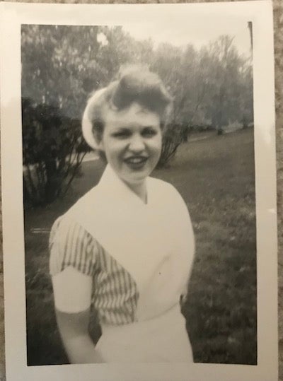 Mary Anne (Maryman) Curtis in a black and white photo in her student nurse's uniform.