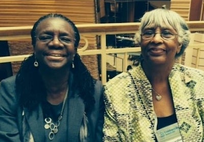 Dr. Edilma Yearwood and Dr. Bernardine Lacey pose for a photograph in 2014 during the American Academy of Nursing meeting.