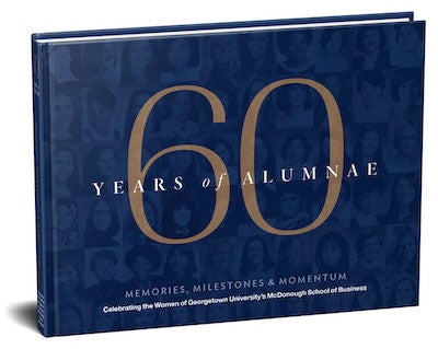 A photo of the new book "60 years of Alumnae" featuring women graduates of Georgetown's business school.