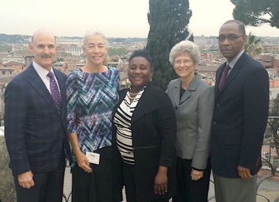 Roberta Waite stands with four other people