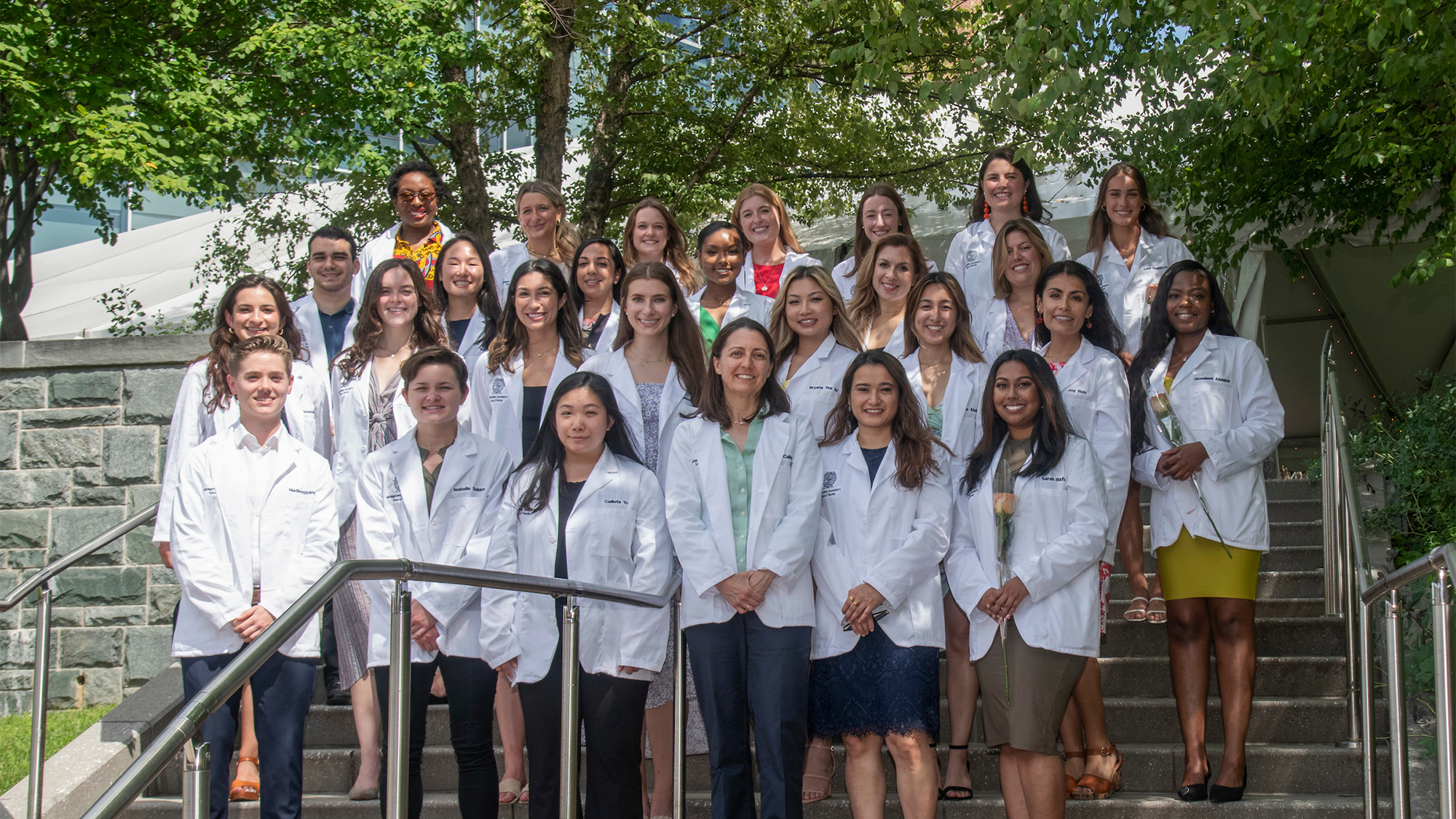 The CNL students in their White Coats stand together