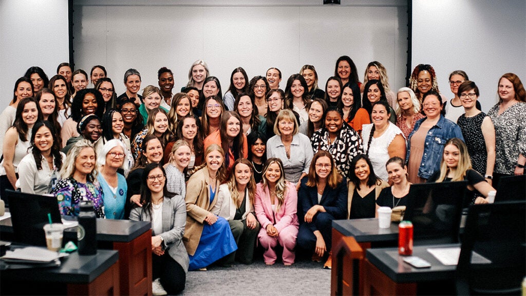 A large group of nursing students and faculty who participated in Advocacy Day stand together for a photo