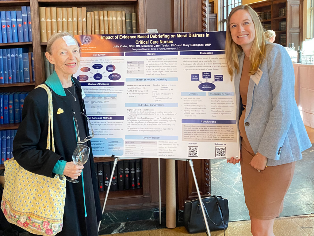 BSN-DNP student Julia Krebs and former dean Elaine Larson at a doctoral student conference.