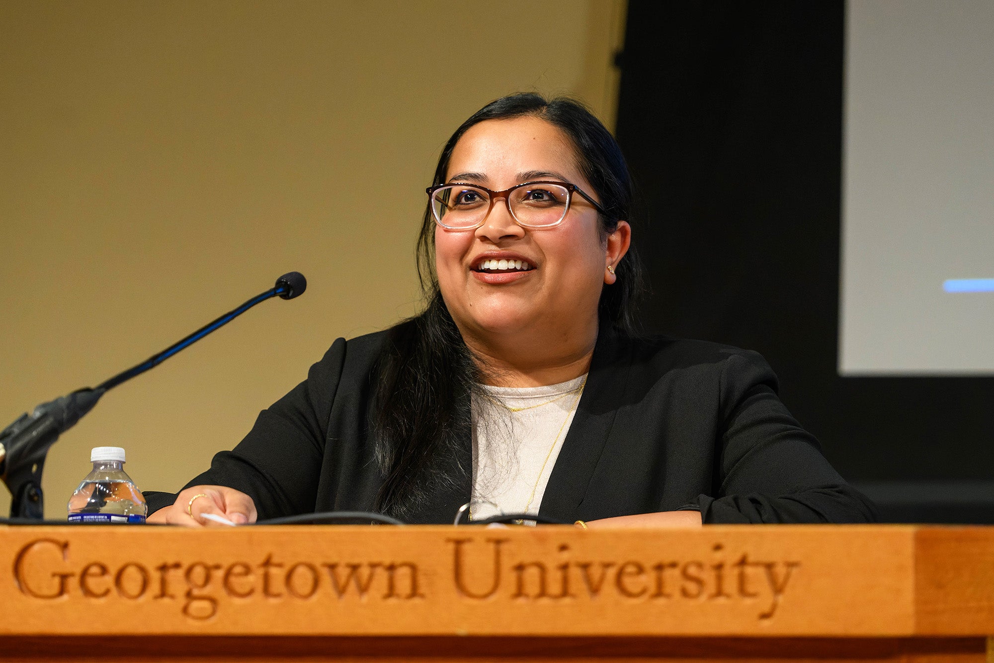 Purvi Patel speaks from a podium