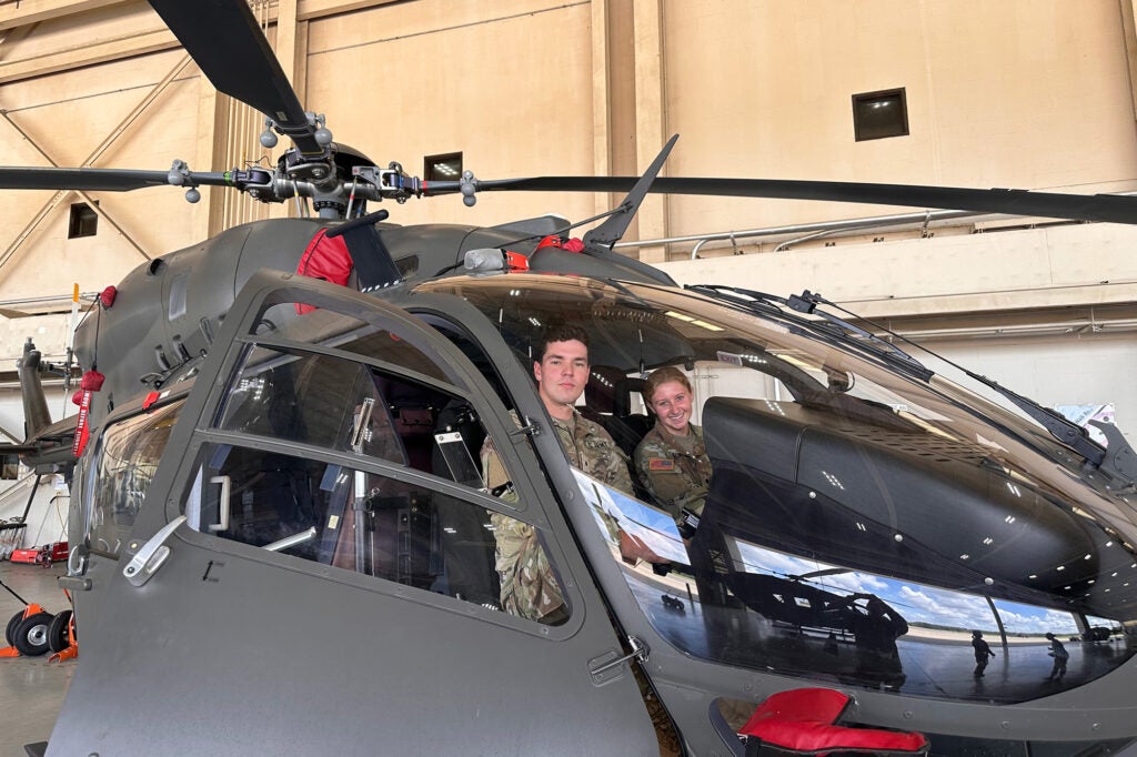 Dombroski and fellow ROTC student in a helicopter