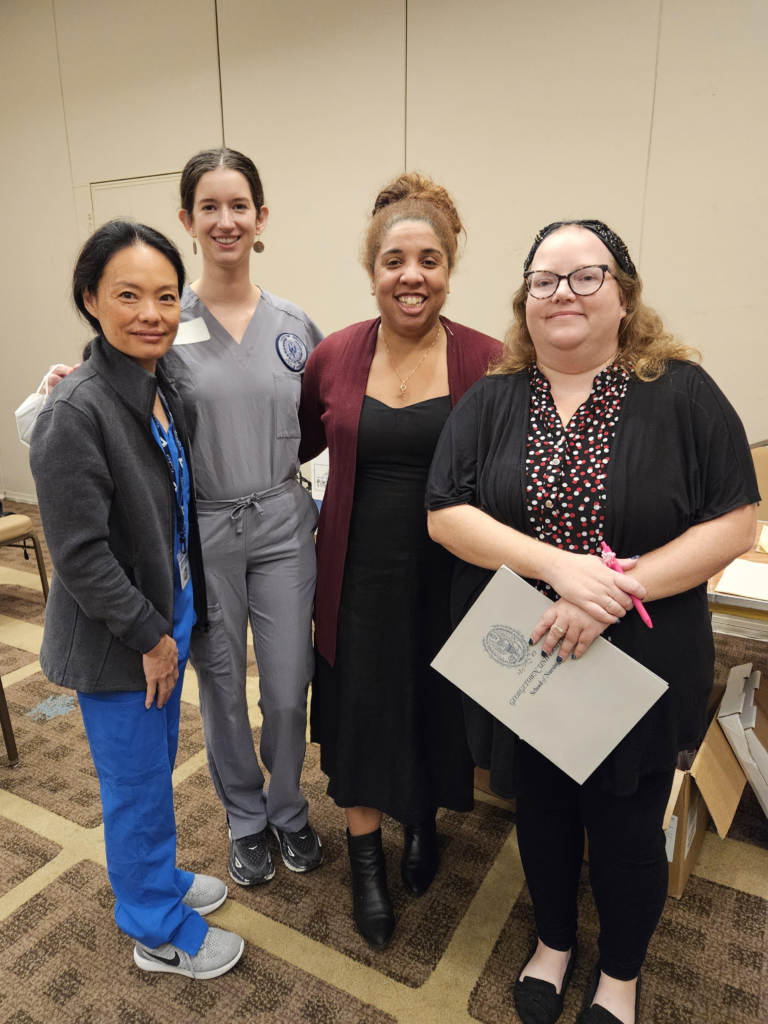 Nursing faculty leaders that managed the flu clinics stand together.