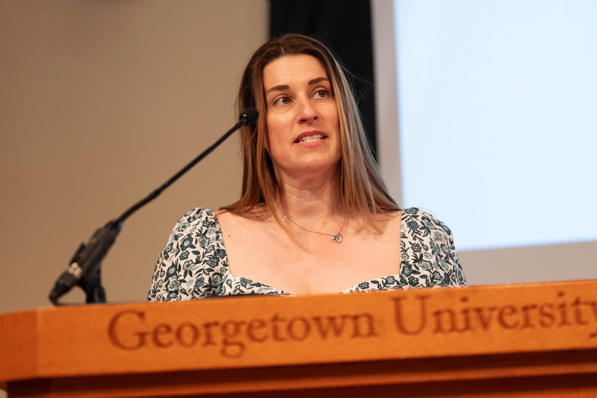 Lisa Marie Hannon speaks from a podium