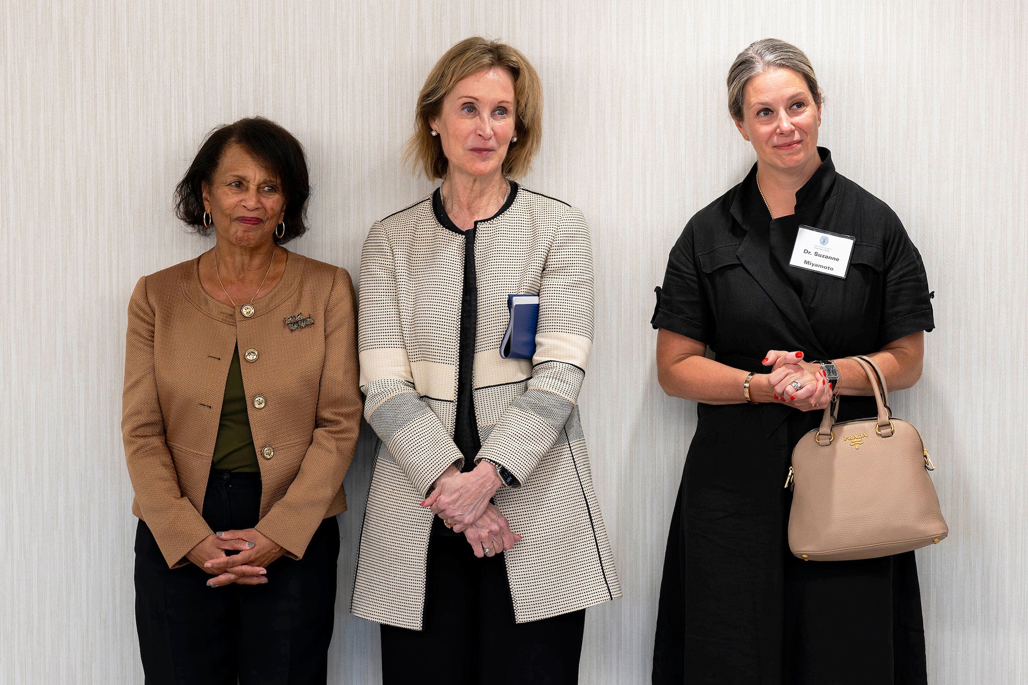 Three nurse leaders stand together
