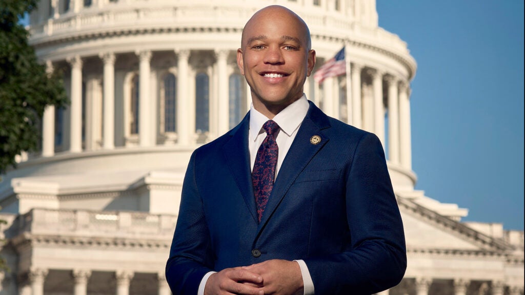 Stephan Davis stands before the U.S. Capitol Building