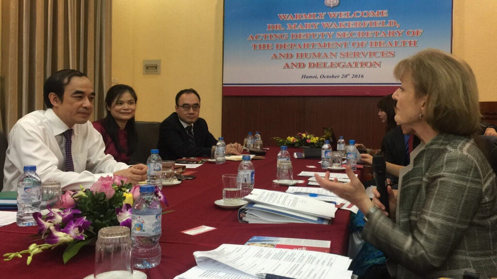 Mary Wakefield speaks to a delegation at Vietnam Medical University