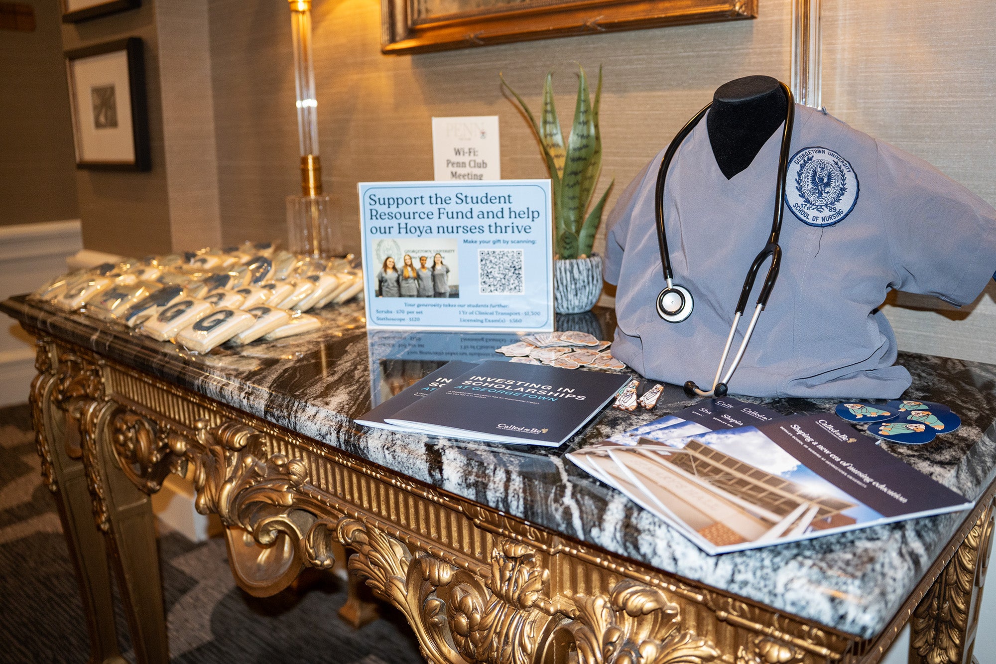 A table arrayed with Nursing Week items including cookies