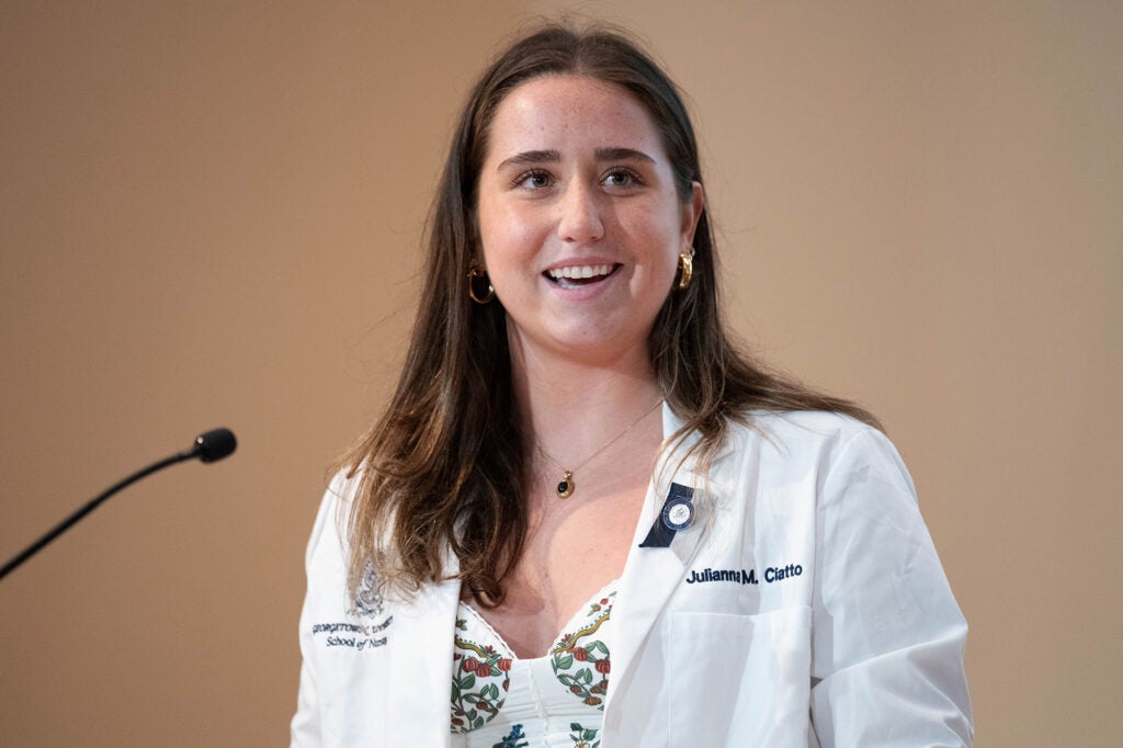 Julianna Ciatto speaks from a podium